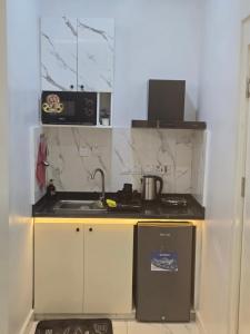 Kuchyň nebo kuchyňský kout v ubytování TW-Residence + 18 fotografií