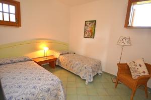 Una cama o camas en una habitación de Trulli Sul Mare