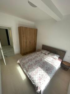 Postel nebo postele na pokoji v ubytování Triumph residence Bar