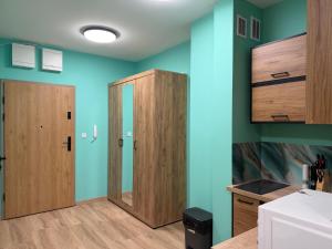 Køkken eller tekøkken på Rumia Apartment by JumpInHere + 3 billeder