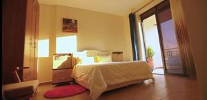 En eller flere senge i et værelse på Lake Victoria Grand View + 2 billeder