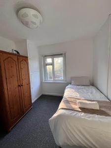 Ένα ή περισσότερα κρεβάτια σε δωμάτιο στο Cardiff Bay