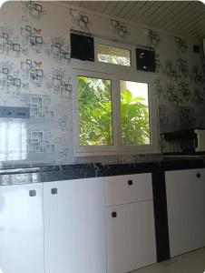 Køkken eller tekøkken på Wind chimes villa