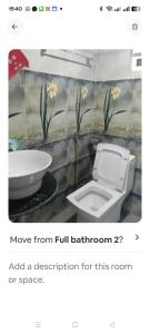 Et badeværelse på Wind chimes villa