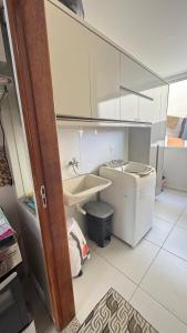 Phòng tắm tại Apartamento dois quartos em Guriri Sul