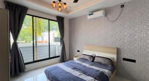 Una cama o camas en una habitación de Seaside