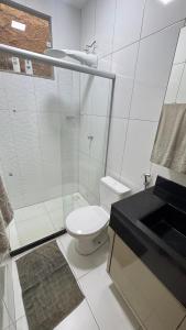 Phòng tắm tại Apartamento dois quartos em Guriri Sul