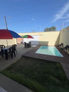 Πισίνα στο ή κοντά στο CASA DE 4 QUARTOS com piscina px a praia do aracagy 16 pessoas
