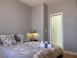 Postel nebo postele na pokoji v ubytování Maison Thalie