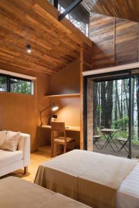 Una cama o camas en una habitación de Kaya Retreat