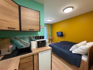 Køkken eller tekøkken på Rumia Apartment by JumpInHere