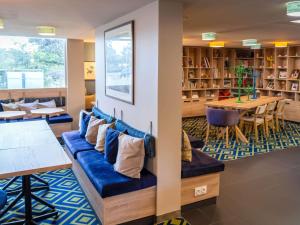 Χώρος καθιστικού στο Novotel Orléans Chemins De Sologne Demeures De Campagne