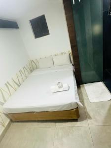 Ένα ή περισσότερα κρεβάτια σε δωμάτιο στο Day Caucon Bukit Bintang