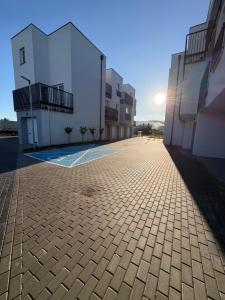 Swimmingpoolen hos eller tæt på Rumia Apartment by JumpInHere