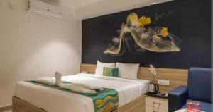 Ένα ή περισσότερα κρεβάτια σε δωμάτιο στο POP 84109D Hotel O Near Jodimetla X Roads