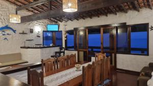 Khu vực ghế ngồi tại Casa Bela Vista Ilha de Jaguanum