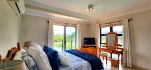 TV a/nebo společenská místnost v ubytování Under The Boardwalk