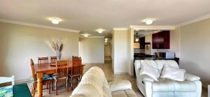 Posezení v ubytování Under The Boardwalk