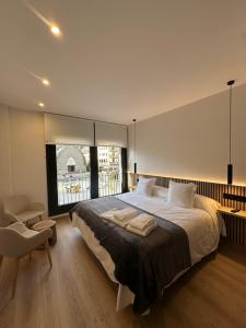 Ένα ή περισσότερα κρεβάτια σε δωμάτιο στο El tossalet Hotel - Apartament +42 φωτογραφίες