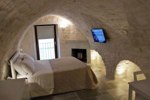 En eller flere senge i et værelse på Campanile Inn