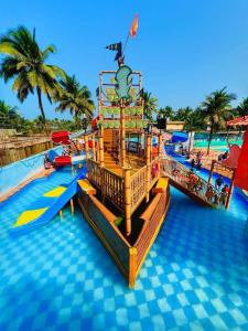 a pirate ship in a pool at a resort at Dreamworld Waterpark Resort Virar in Virār