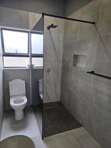 Koupelna v ubytování iThusi stream + 7 fotografií