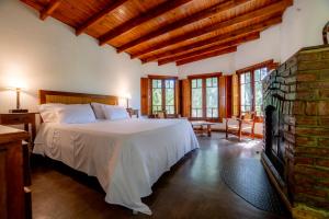 Кровать или кровати в номере Estancia La Cinacina