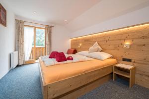 Postel nebo postele na pokoji v ubytování Landhaus Dajana + 95 fotografií