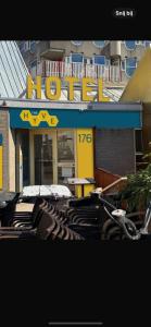 a building with a honda sign in front of it at The Hyve Budget Hotel Rotterdam in Rotterdam