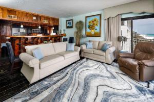 a living room with a couch and two couches at Gulf Side 601 Pet friendly gulf front condo in Fort Walton Beach