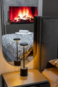 Un pat sau paturi într-o cameră la Apartman Elite Stay Doboj