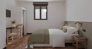 Ένα ή περισσότερα κρεβάτια σε δωμάτιο στο My Rooms Las Salas by My Rooms Hotels - Hotel Boutique