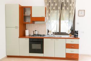 Η κουζίνα ή μικρή κουζίνα στο Casa Orchidea