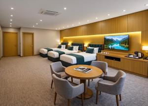 TV a/nebo společenská místnost v ubytování Khatai Rest Hotel