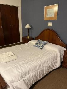 Ένα ή περισσότερα κρεβάτια σε δωμάτιο στο 3Reyes +21 φωτογραφίες