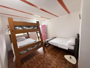 Postel nebo postele na pokoji v ubytování Mirador Verde By Nala + 15 fotografií