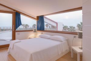 Ένα ή περισσότερα κρεβάτια σε δωμάτιο στο Lalena's Garden