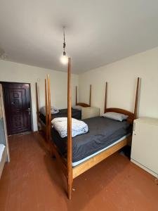 Rova Home & Hostel 객실 침대