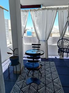 Et opholdsområde på Divine Blue Suite