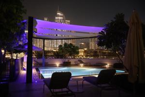 Πισίνα στο ή κοντά στο Grande Signature Downtown Heaven Stay Vacation Home