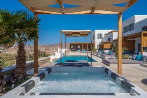 Bazén v ubytování CASA DI PIETRA MYKONOS nebo v jeho okolí