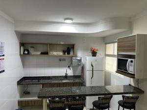 Η κουζίνα ή μικρή κουζίνα στο Lacqua Diroma 1 2 3 4 5