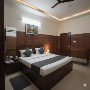 En eller flere senge i et værelse på Rainbow Inn - Opp Azadpur Main Mandi