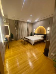 Postel nebo postele na pokoji v ubytování 湖庭 residents + 9 fotografií