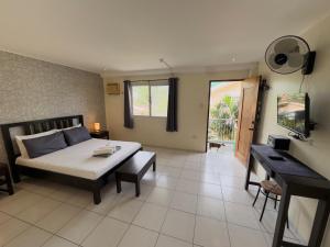 Ένα ή περισσότερα κρεβάτια σε δωμάτιο στο Victoria's Bed & Breakfast