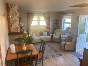 Χώρος καθιστικού στο Primrose Cottage