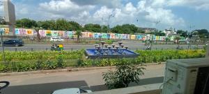 a view of a street with a parking lot at HOTEL MAHER Inn in Ahmedabad