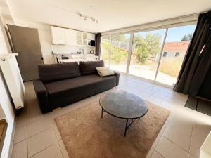 Un lugar para sentarse en 2 pièces cosy à 15 min de Paris