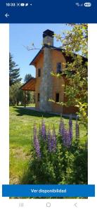 Κήπος έξω από το Complejo Vista al Piltri