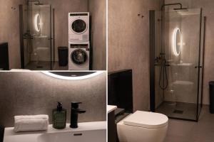 een badkamer met een toilet en een douche met een wasmachine bij Premium Rural Apartment - Leknes in Leknes +23 foto's